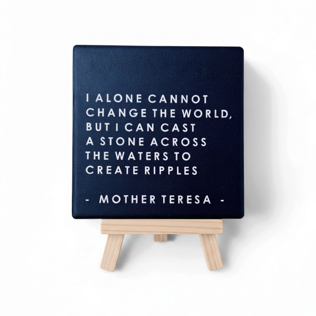 Let's Be Frank Australia square ceramic coaster featuring a Mother Teresa quote on a dark blue background on a stand.